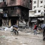 AA-20240131-33574861-33574848-ISRAIL_ORDUSU_GAZZE_KENTI_SOKAKLARINDAN_ENKAZ_BIRAKARAK_CEKILDI
