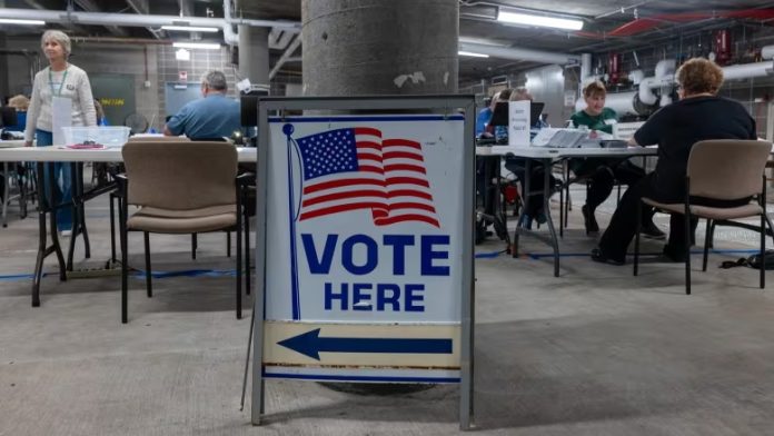 wisconsin-poll-workers-counting-ballots-at-city-hall-building-in-janesville-wis